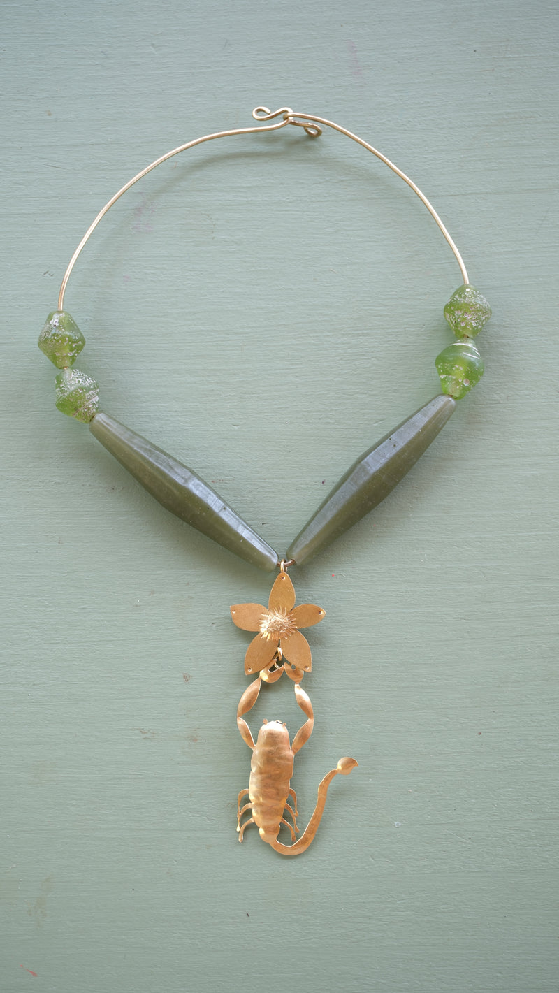 Scorpion collar and glass shards