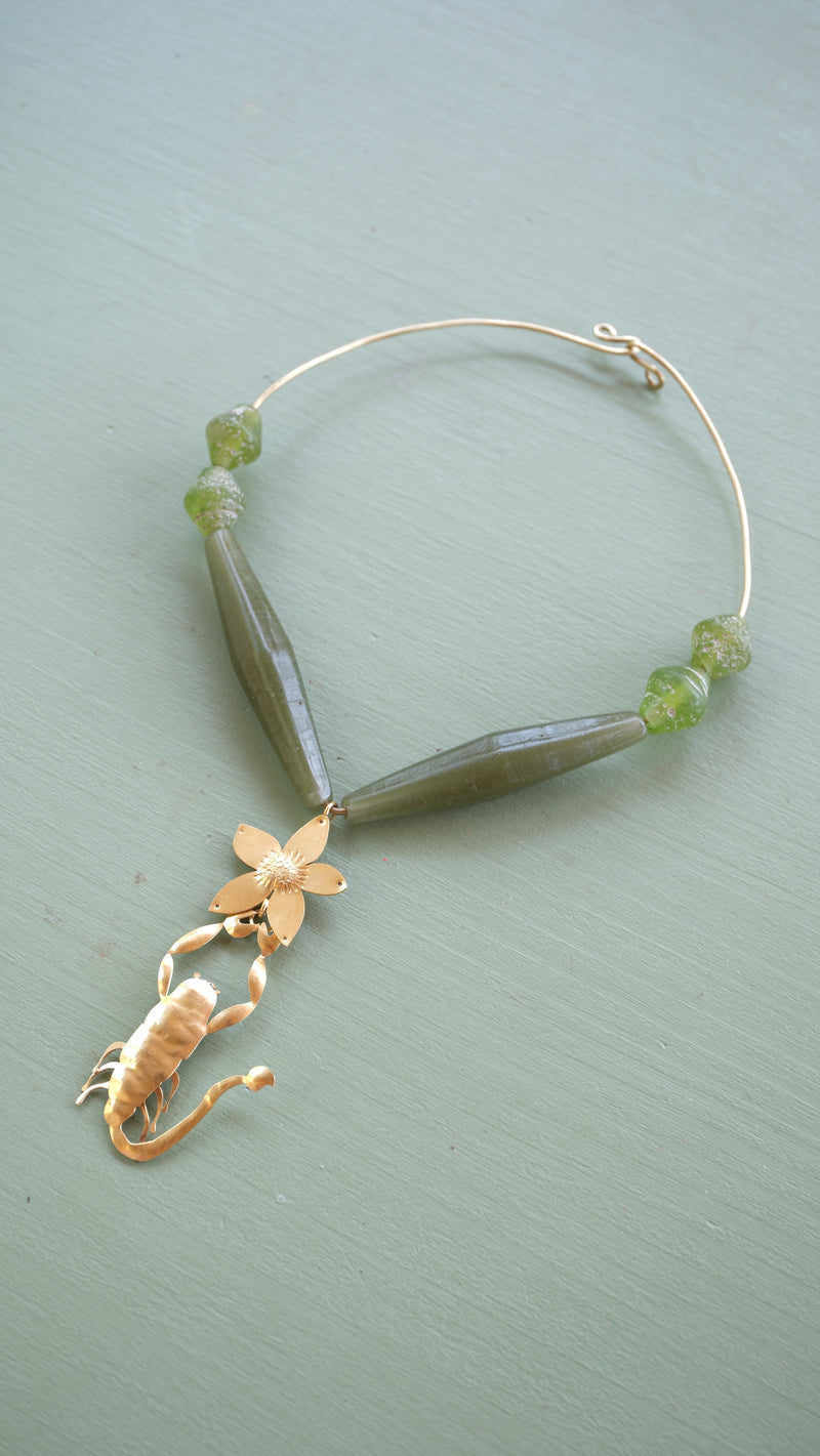 Scorpion collar and glass shards
