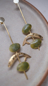 Pendientes pinchito sardinas y aceitunas