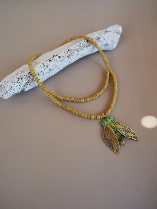 Cicada and glass necklace