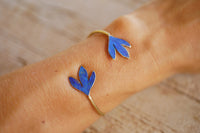 Brazalete plumaje