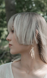 Pendientes largos soñadoras humano