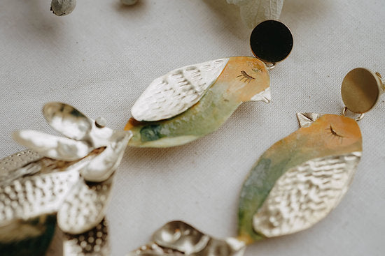 pendientes largos pajaros y plumas